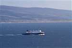 CalMac ferry MV Finlaggan leaving West Loch Tarbert