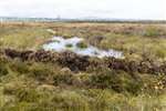 Peat bund blocks the drainage from Flanders Moss raised bog