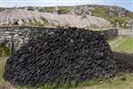 Peat stack at blackhouse village, na Gearrannan, Lewis