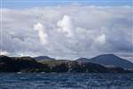 The hills and cliffs of SW Lewis from MV Lochlann on a St Kilda boat trip from Miabhaig