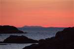 Sunset over Barra from Coll